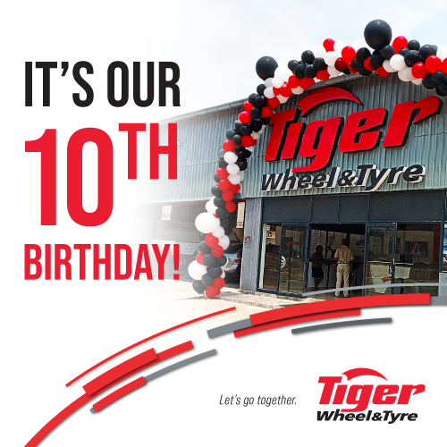 A Tiger Wheel & Tyre Zimbabwe store with a balloon arch in front of it