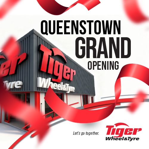 Queenstown Grand Opening - Tiger Wheel & Tyre branch with red confetti falling around it